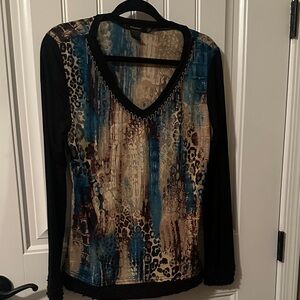 Black, tan, and blue animal print top.